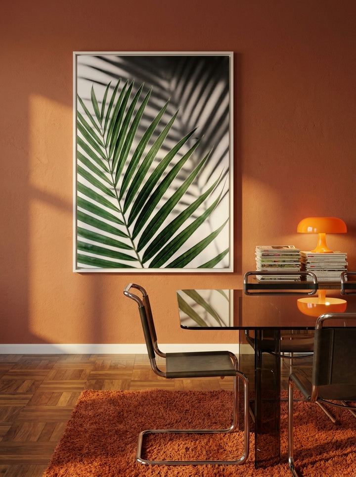 Oversized statement canvas wall art with a white surround styled on the wall in a retro 70s dining room