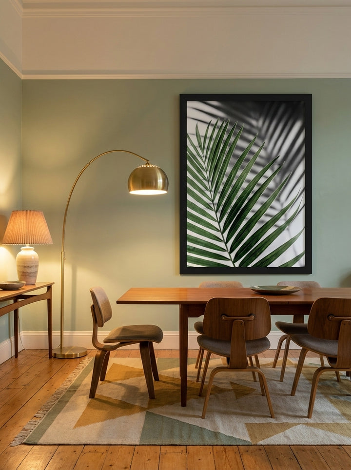 Oversized statement modern wall art print styled on the wall in a mid-century dining room