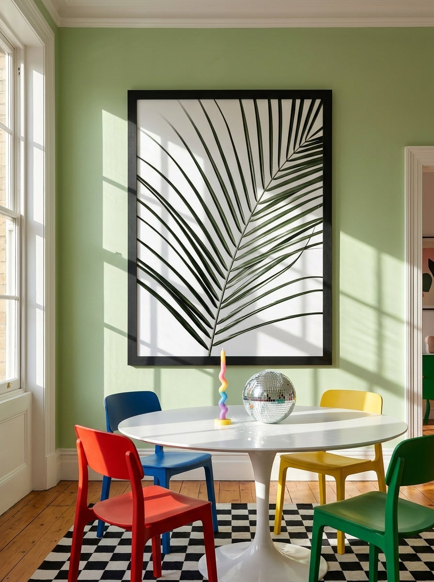 Oversized statement modern wall art print styled on the wall in a colourful eclectic dining room