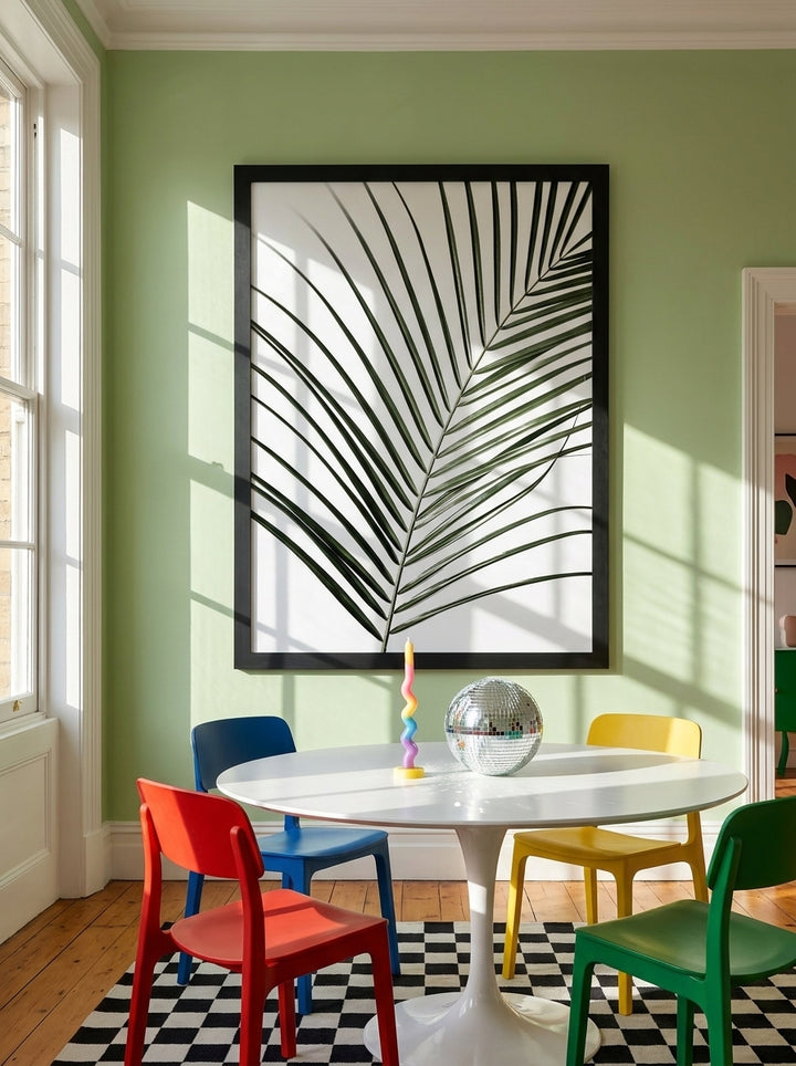 Oversized statement modern wall art print styled on the wall in a colourful eclectic dining room