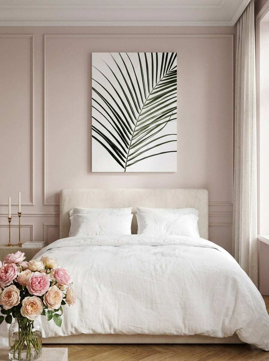 Stretched canvas wall art styled on the wall in a Parisian bedroom