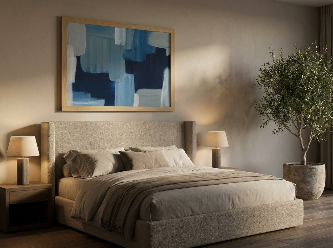 Oversized statement modern wall art print styled on the wall in a luxe bedroom