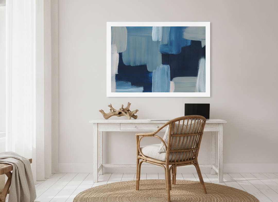 Modern wall art print styled on the wall in a coastal home office