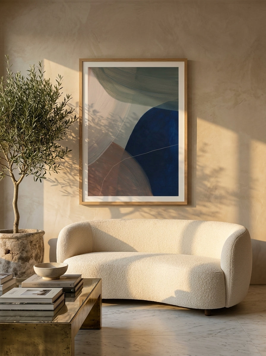 Modern wall art print styled on the wall in a luxe living room