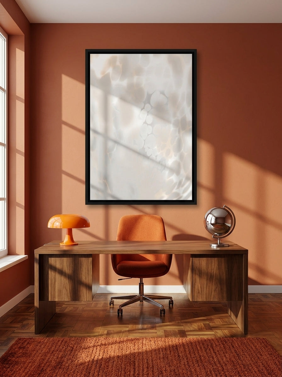 Canvas wall art with a black surround styled on the wall in a retro 70s home office