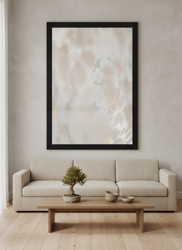 Oversized statement modern wall art print styled on the wall in a warm Japandi living room