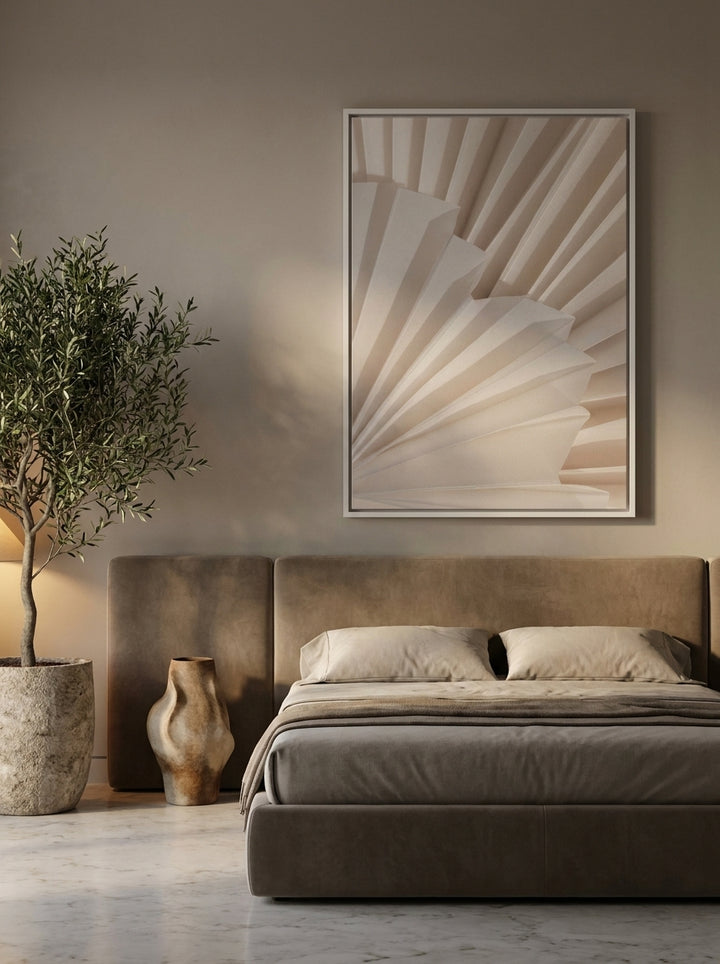 Oversized statement canvas wall art with a white surround styled on the wall in a luxe bedroom