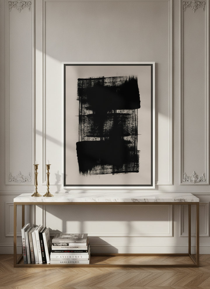 Canvas wall art with a white surround standing on a console in a Parisian home office