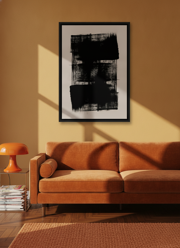 Canvas wall art with a black surround styled on the wall in a retro 70s living room