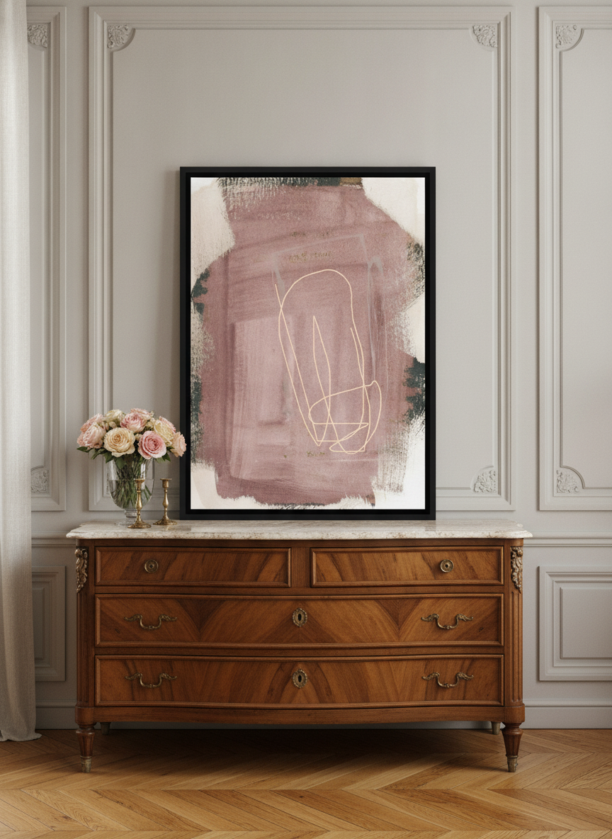 Canvas wall art with a black surround standing on a sideboard in a Parisian bedroom