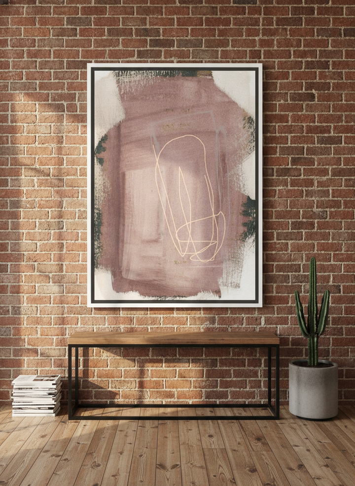 Oversized statement canvas wall art with a white surround styled on the wall in an industrial loft living room