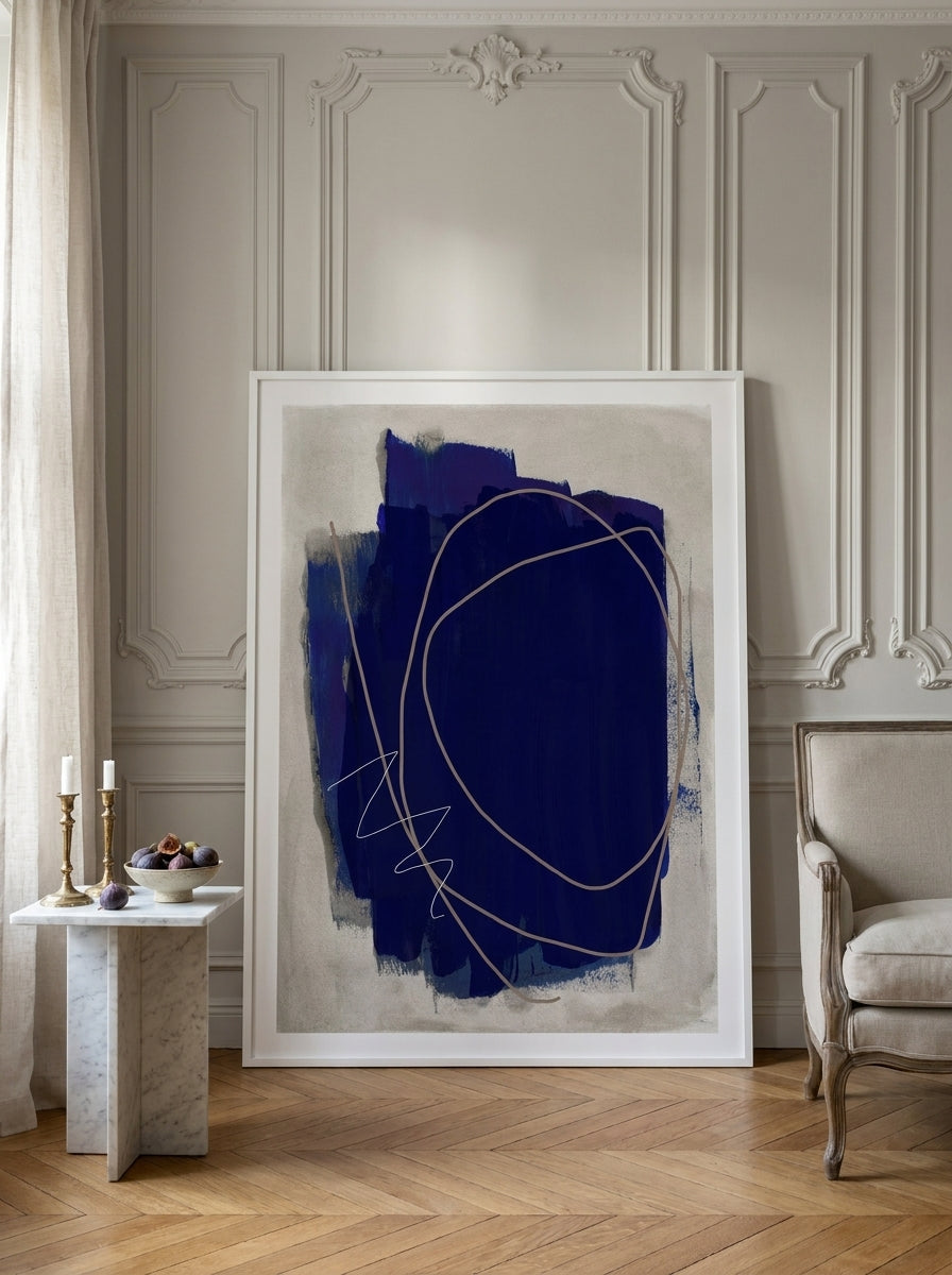 Oversized statement modern wall art print leaning against the wall in a Parisian living room