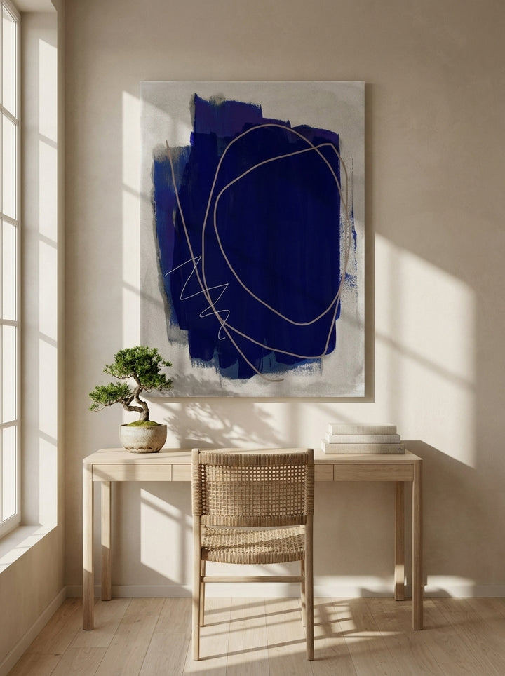 Stretched canvas wall art styled on the wall in a warm Japandi home office