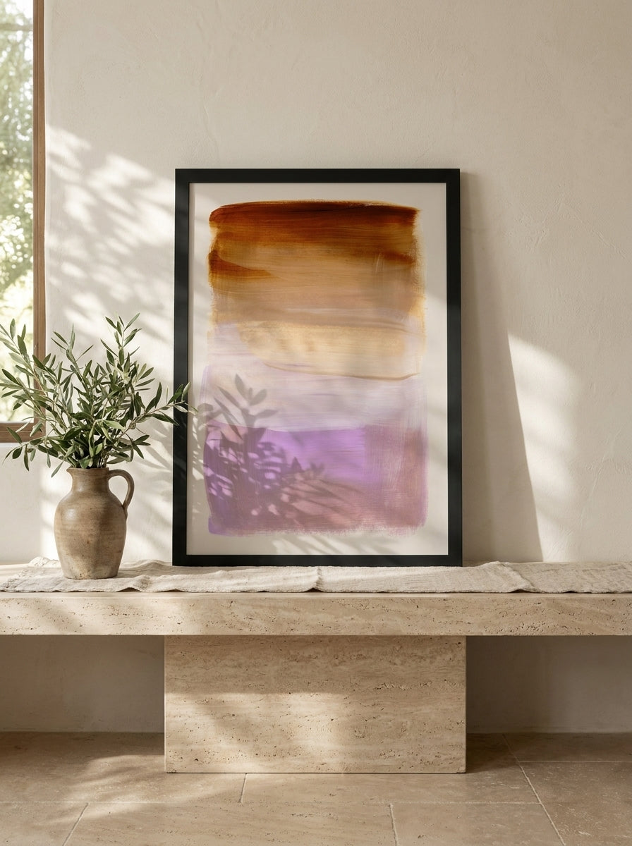 Modern wall art print standing on a console in a Mediterranean living room