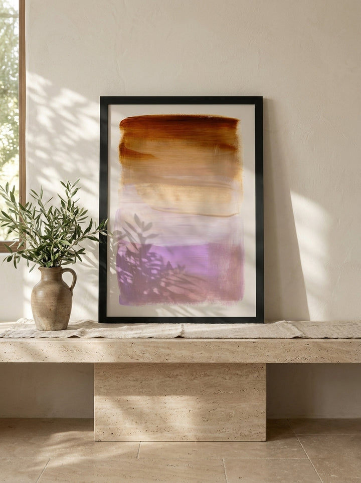 Modern wall art print standing on a console in a Mediterranean living room