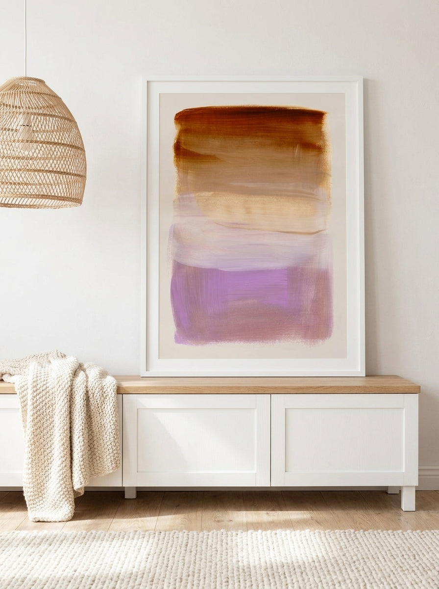 Modern wall art print standing on a sideboard in a bright Scandinavian bedroom
