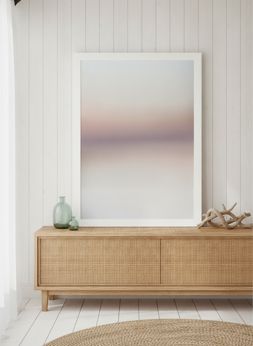 Modern wall art print standing on a sideboard in a coastal bathroom