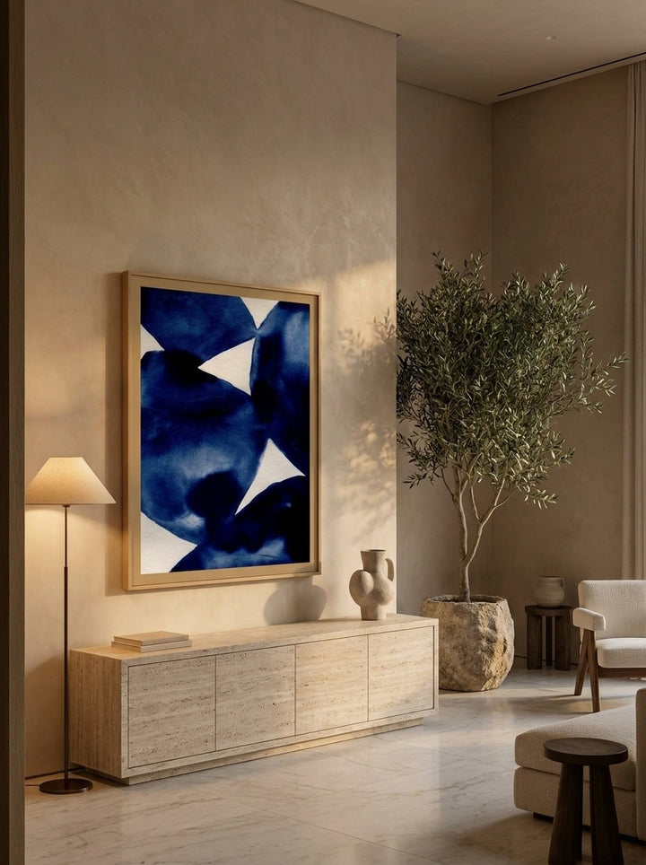 Oversized statement modern wall art print styled on the wall in a luxe living room