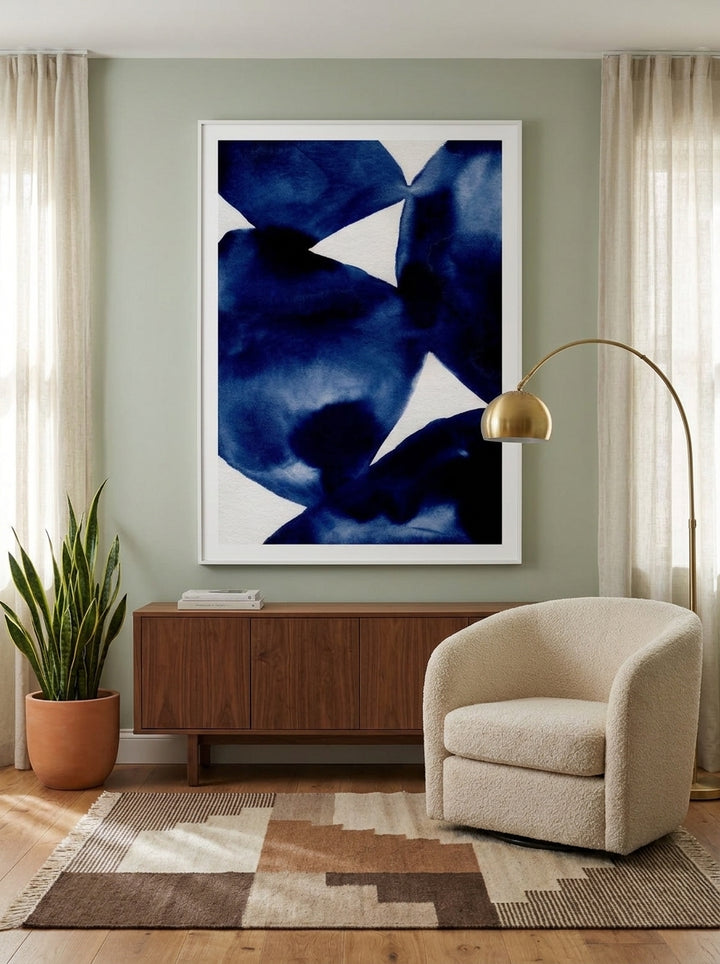 Oversized statement modern wall art print styled on the wall in a mid-century living room