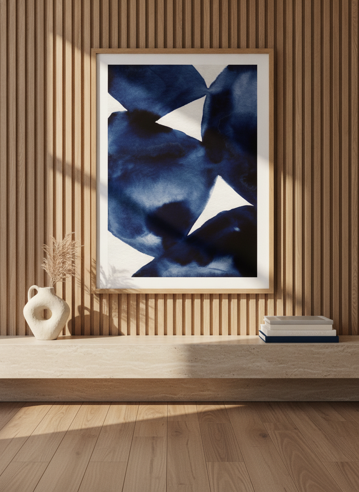 Modern wall art print styled on the wall in a luxe living room