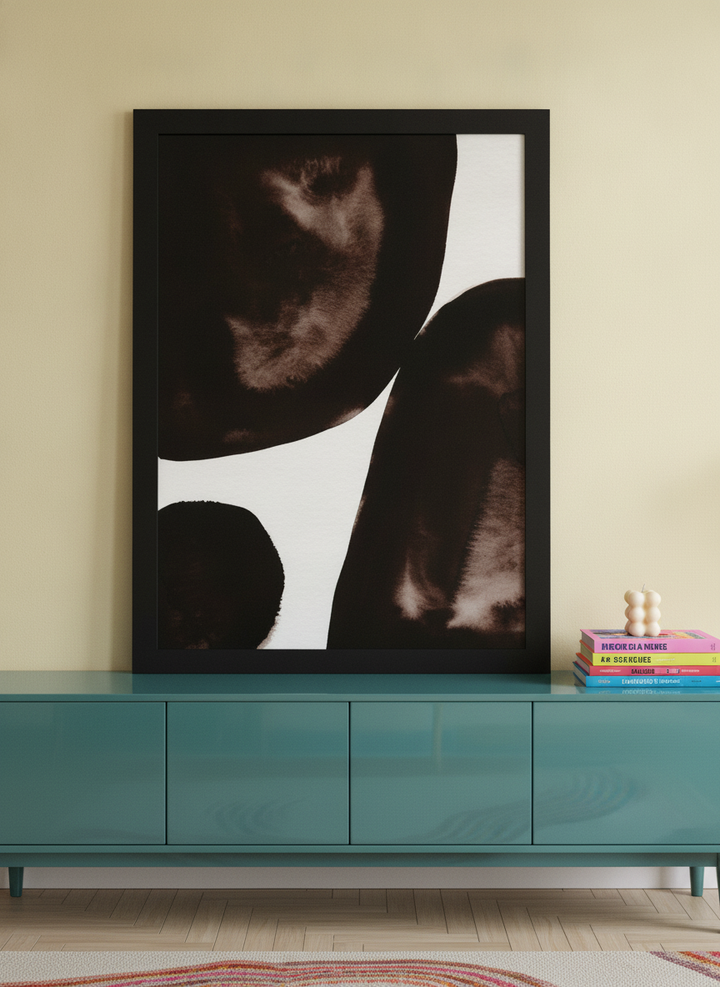 Modern wall art print standing on a sideboard in a colourful eclectic living room