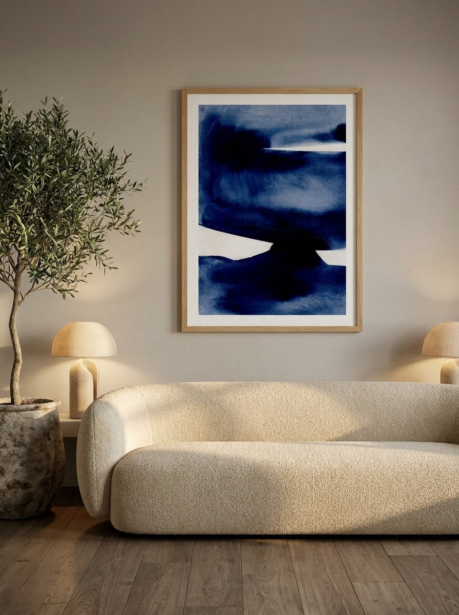 Modern wall art print styled on the wall in a luxe living room