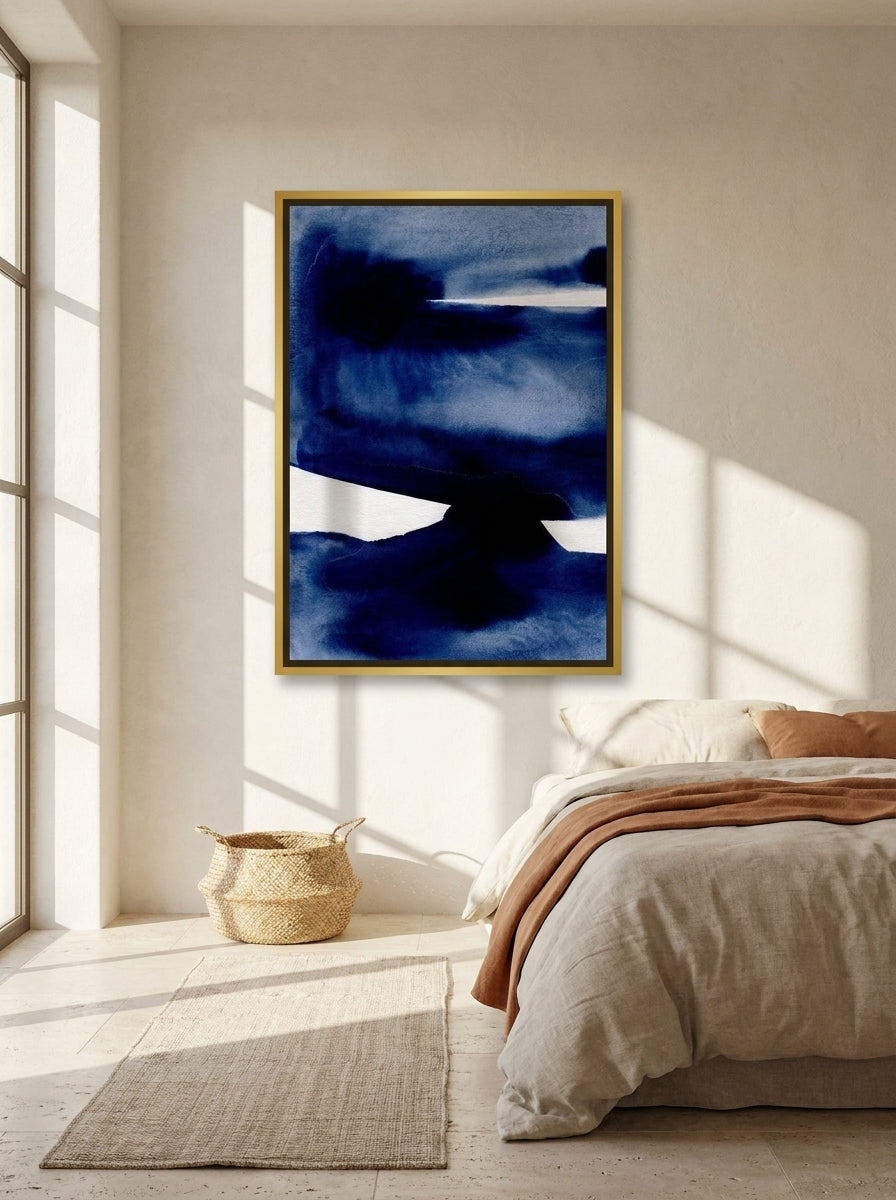 Canvas wall art with a gold leaf surround styled on the wall in a Mediterranean bedroom