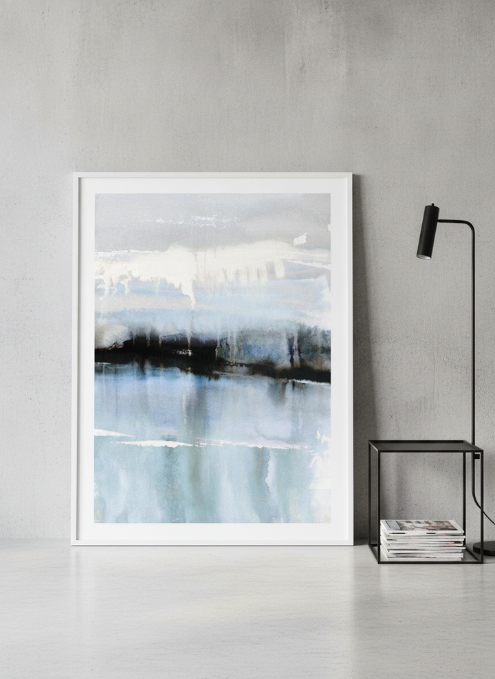 Modern wall art print leaning against the wall in an industrial loft bedroom