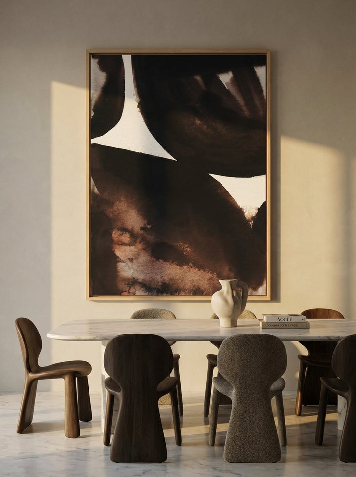 Oversized statement canvas wall art with a natural timber surround styled on the wall in a luxe dining room