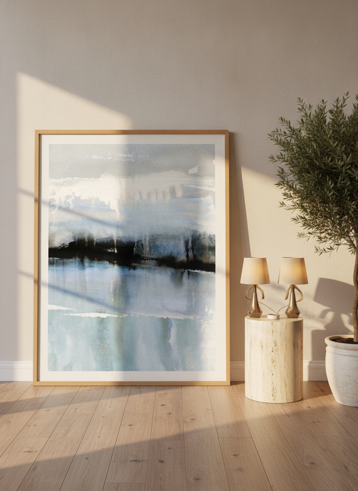 Oversized statement modern wall art print leaning against the wall in a luxe bedroom