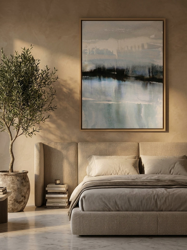 Oversized statement canvas wall art with a natural timber surround styled on the wall in a luxe bedroom