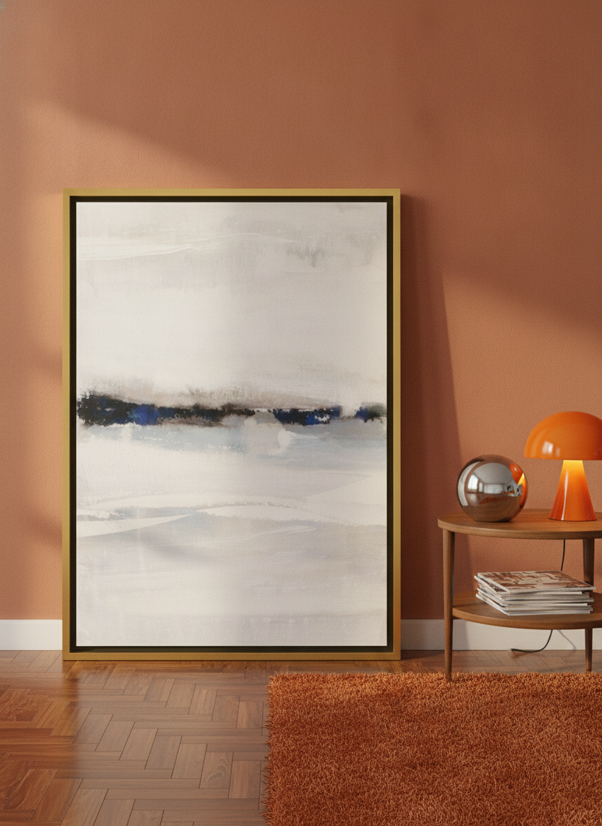 Canvas wall art with a gold leaf surround leaning against the wall in a retro 70s living room