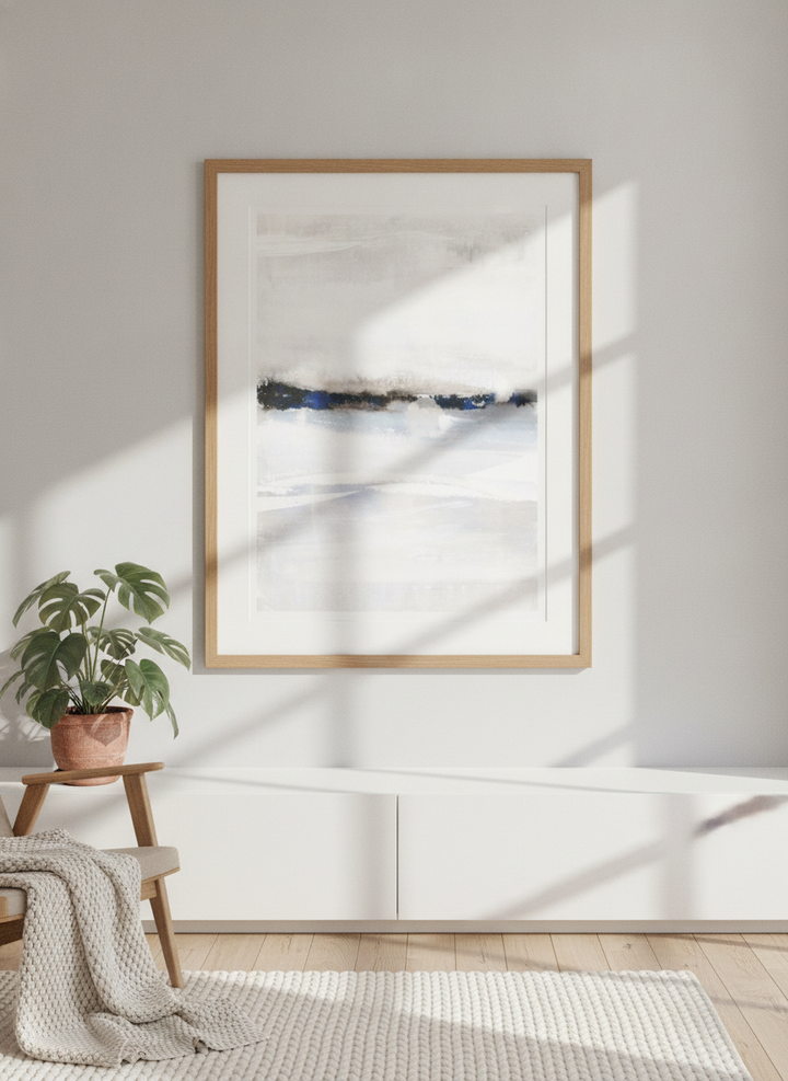 Modern wall art print styled on the wall in a bright Scandinavian living room