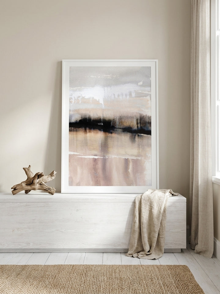 Modern wall art print standing on a console in a coastal home office