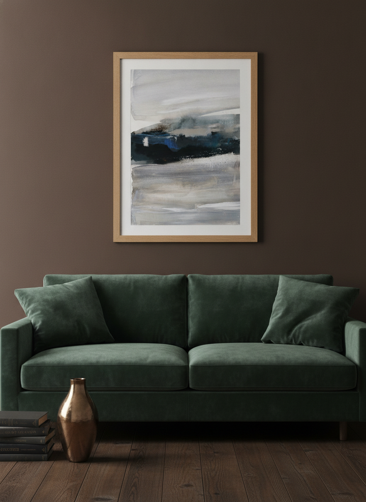 Modern wall art print styled on the wall in a moody living room