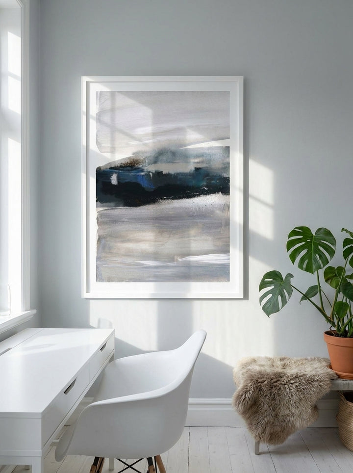 Modern wall art print styled on the wall in a bright Scandinavian home office