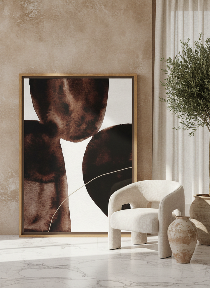 Oversized statement canvas wall art with a natural timber surround leaning against the wall in a luxe bedroom