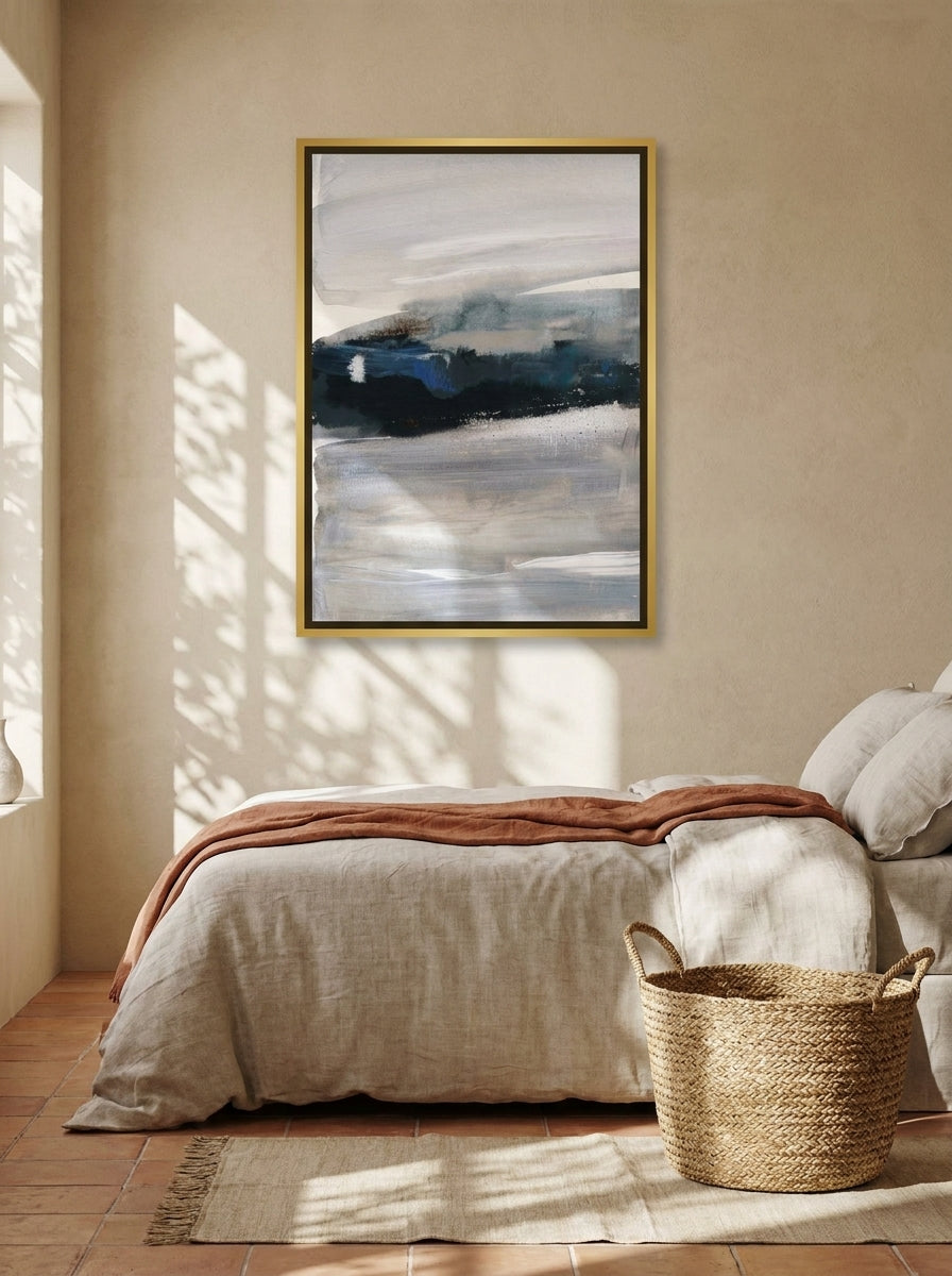 Canvas wall art with a gold leaf surround styled on the wall in a Mediterranean bedroom