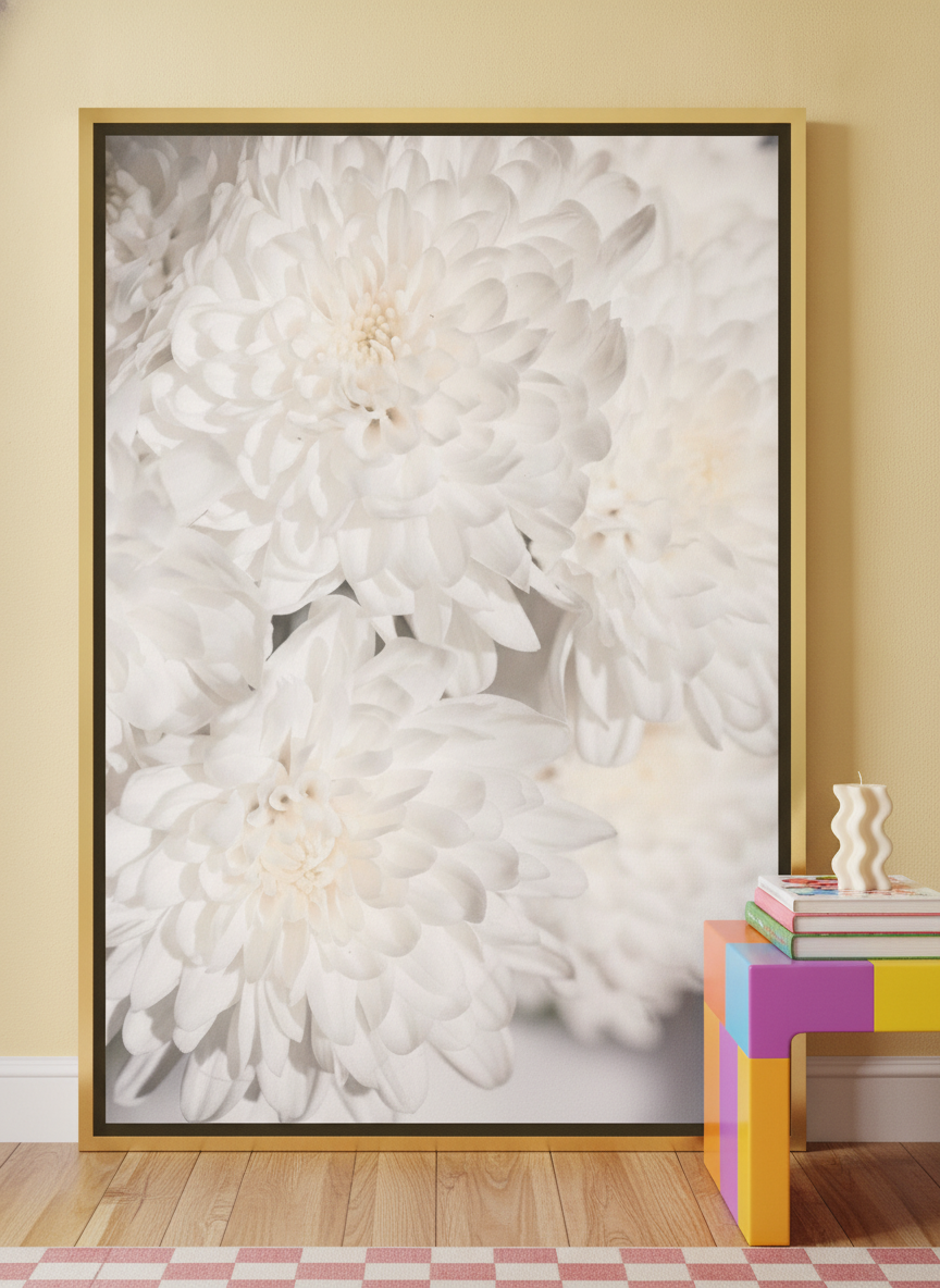 Canvas wall art with a gold leaf surround standing on a side table in a colourful eclectic bedroom