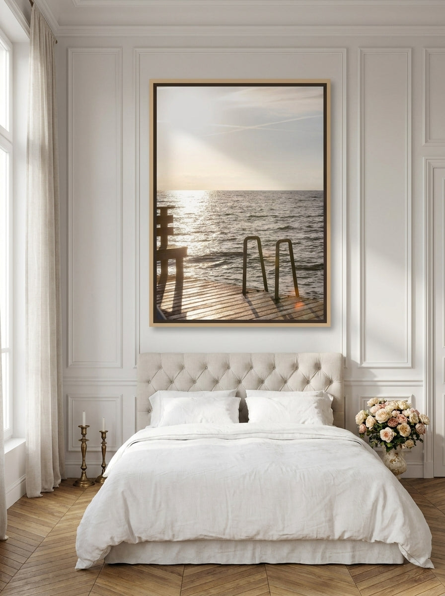 Oversized statement canvas wall art with a natural timber surround styled on the wall in a Parisian bedroom