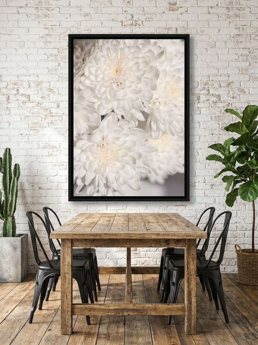 Canvas wall art with a black surround styled on the wall in an industrial loft dining room