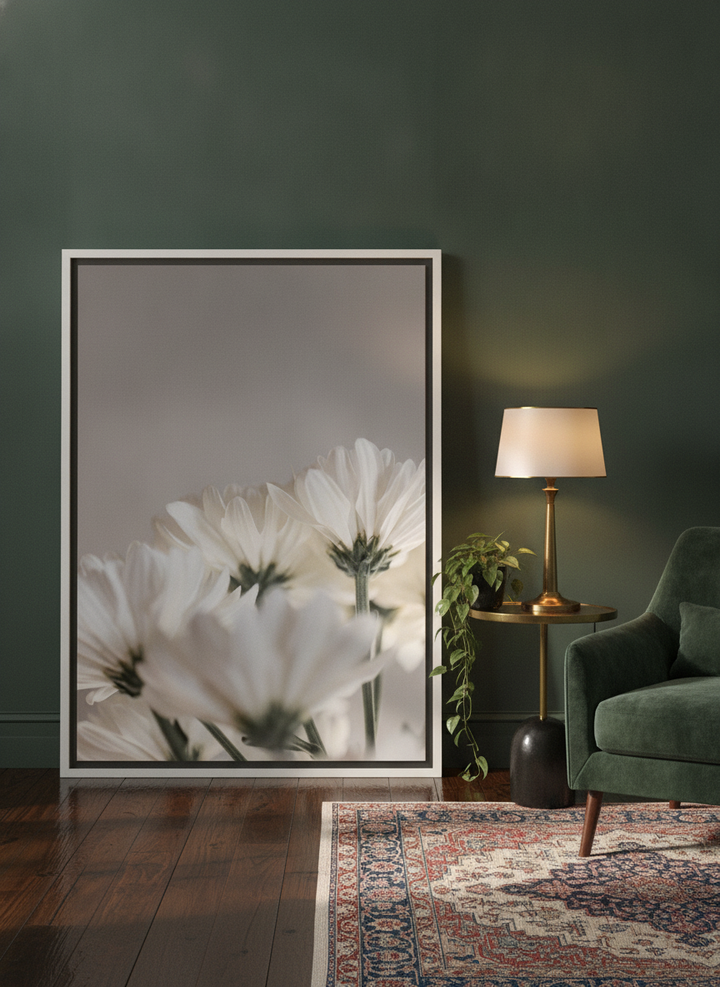 Canvas wall art with a white surround leaning against the wall in a moody dining room