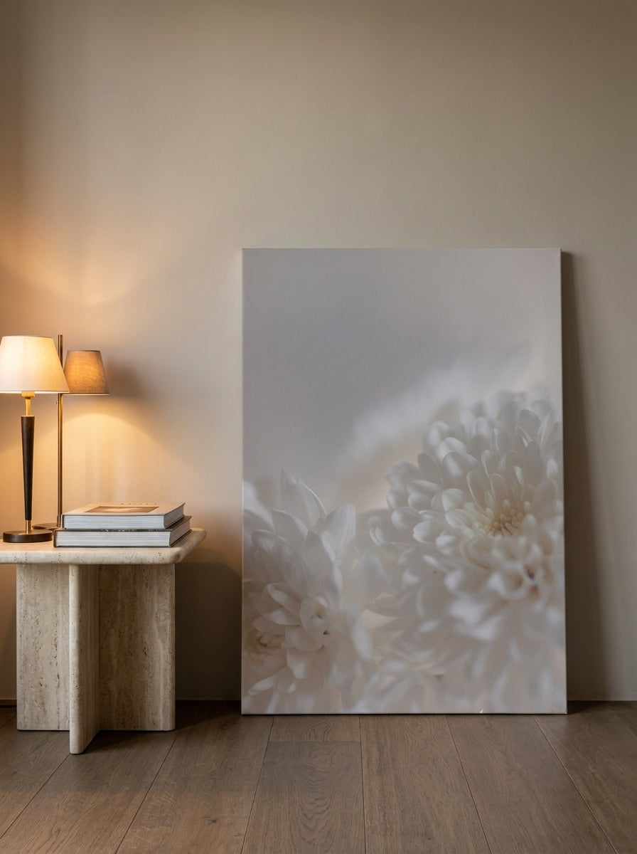 Stretched canvas wall art leaning against the wall in a luxe bathroom