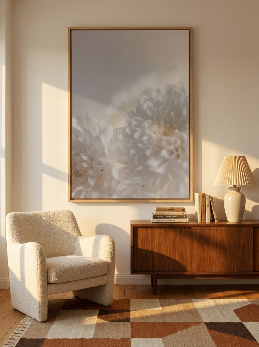 Oversized statement canvas wall art with a natural timber surround styled on the wall in a mid-century living room