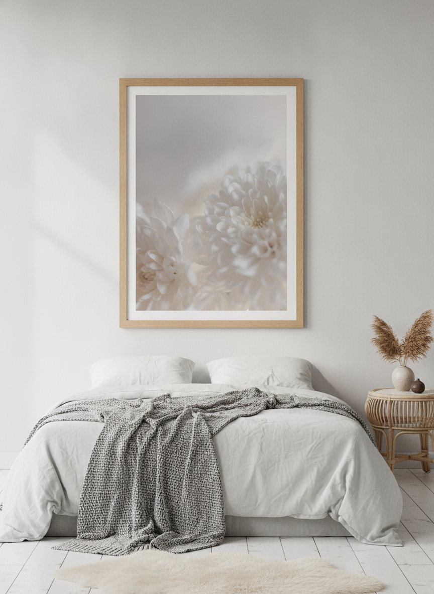 Modern wall art print styled on the wall in a bright Scandinavian bedroom
