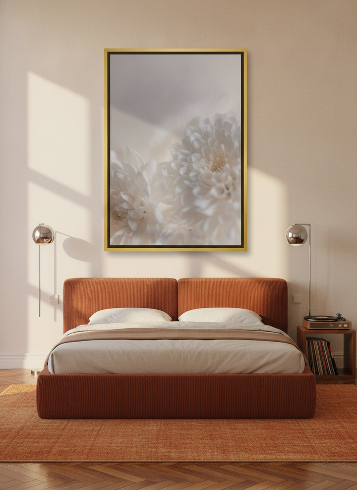 Canvas wall art with a gold leaf surround styled on the wall in a retro 70s bedroom