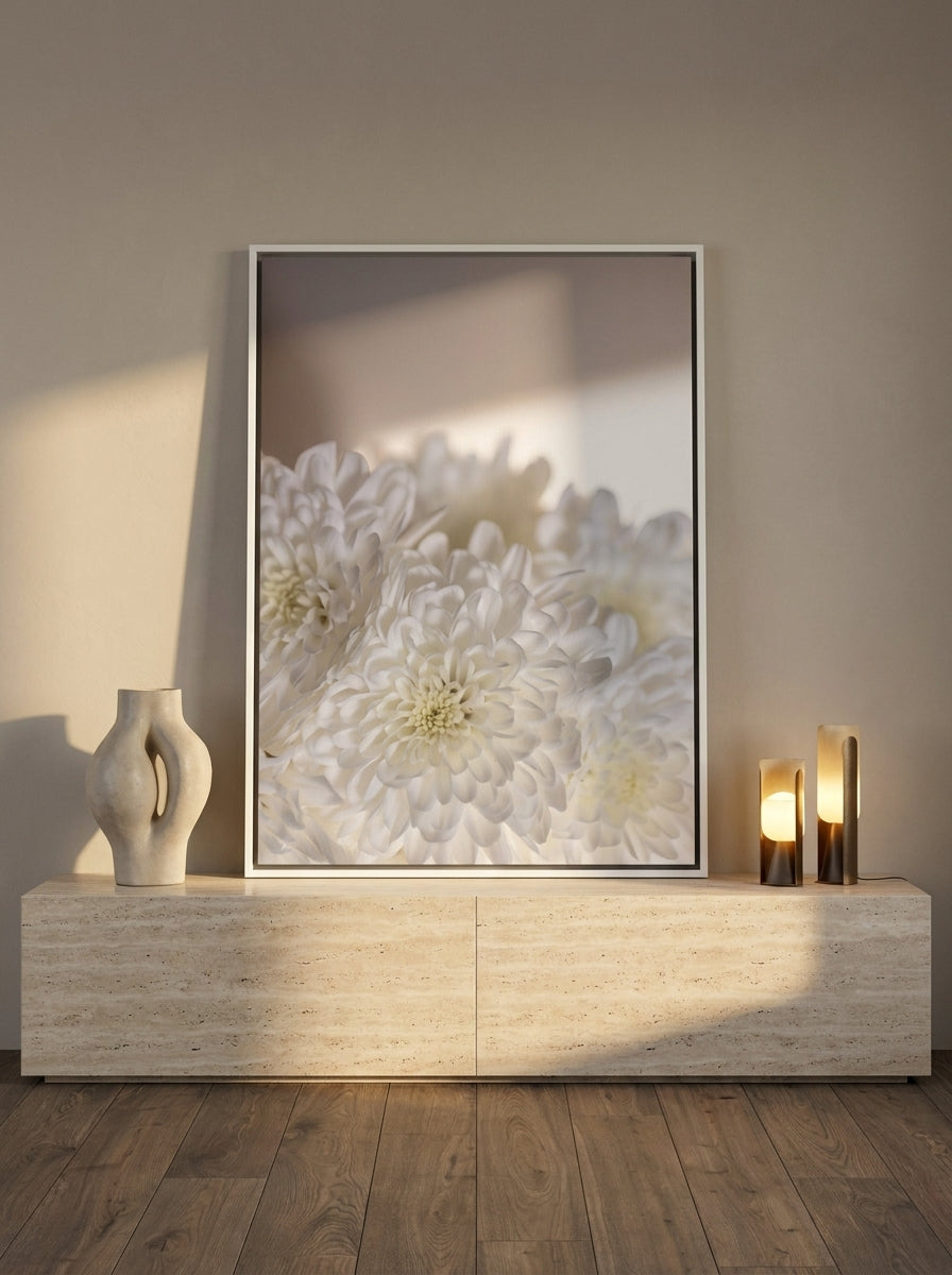 Canvas wall art with a white surround standing on a console in a luxe bedroom
