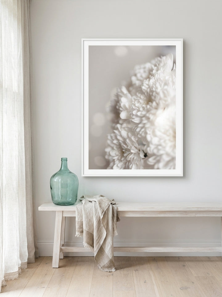Oversized statement modern wall art print styled on the wall in a coastal living room
