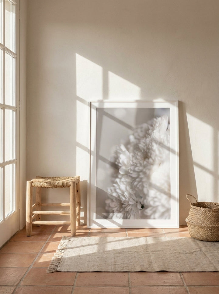 Modern wall art print leaning against the wall in a Mediterranean bedroom