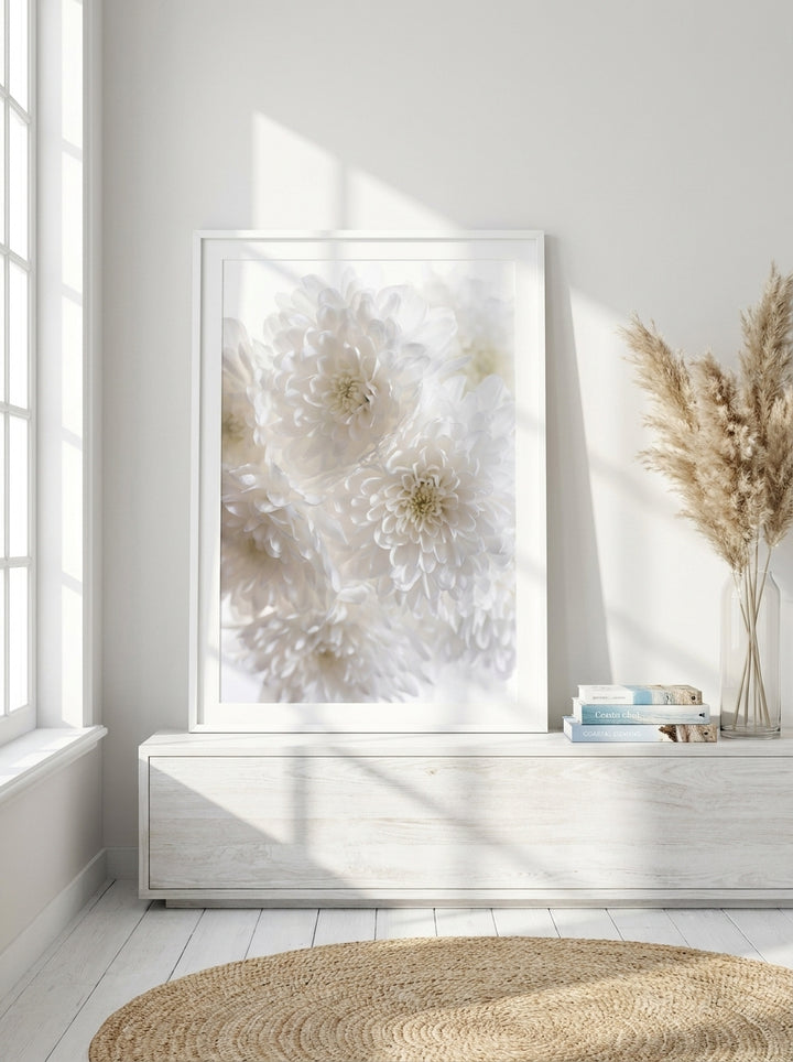 Modern wall art print standing on a console in a coastal bathroom